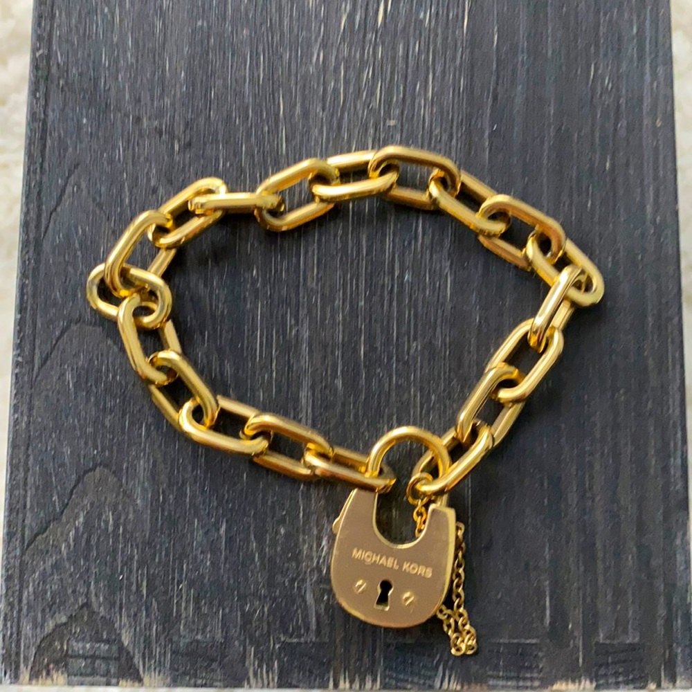 Gold link bracelet with lock